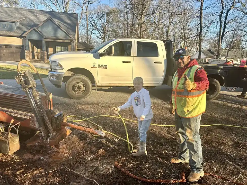 Owner's grandson learning the boring trade on the job site